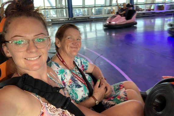 A selfie of a young woman and an older woman in a bumper cart.